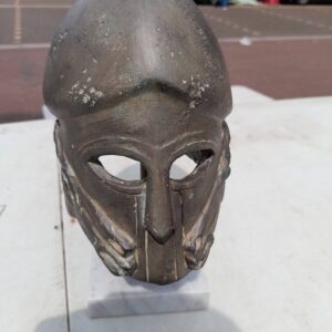 Fantastic Replica of a Greek Corinthian style Helmet  Statue is on a marble base with horses head motif on each cheek sides of the Helmets side design